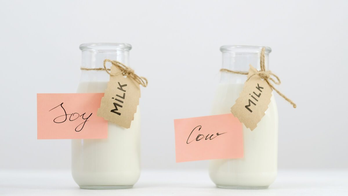 cow milk and soya milk in small bottles labelled