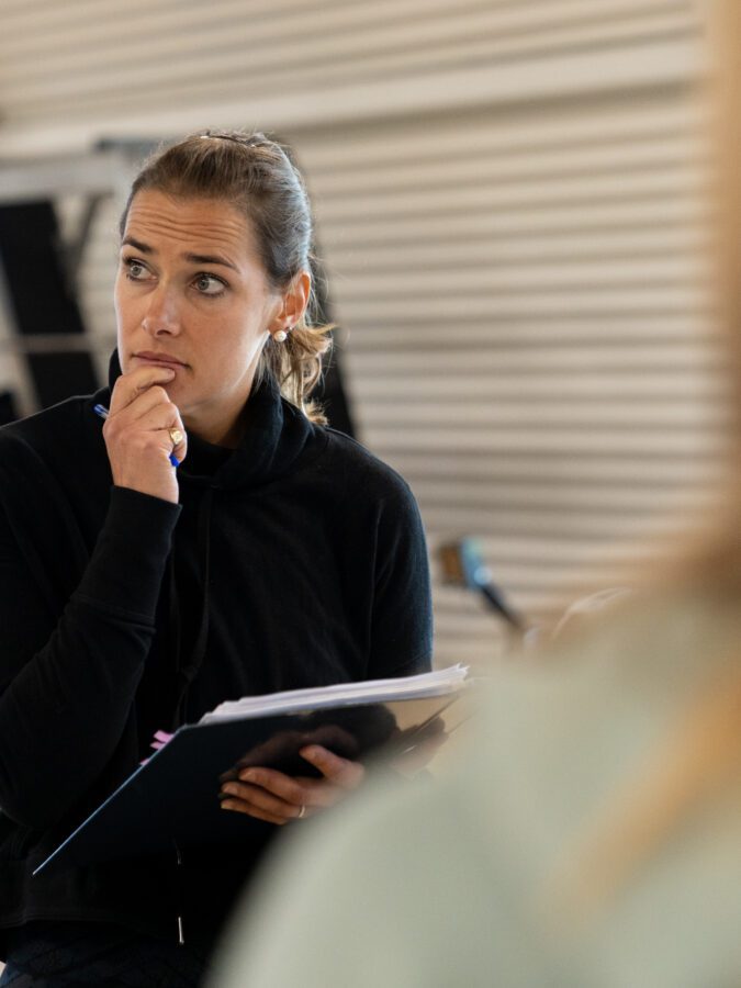 Personal training course tutor teaching a practical training class