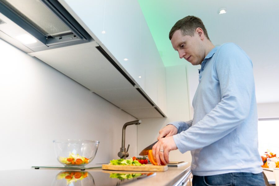 Nutrition coach preparing a salad