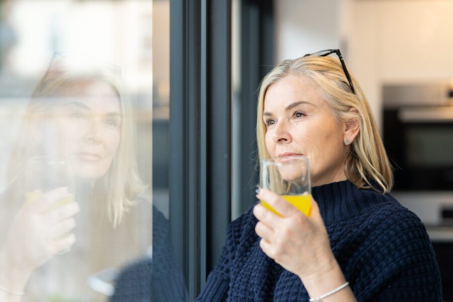 Nutrition coach looking out the window