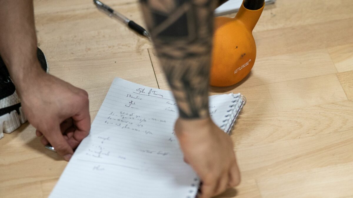 Personal Training course student taking notes