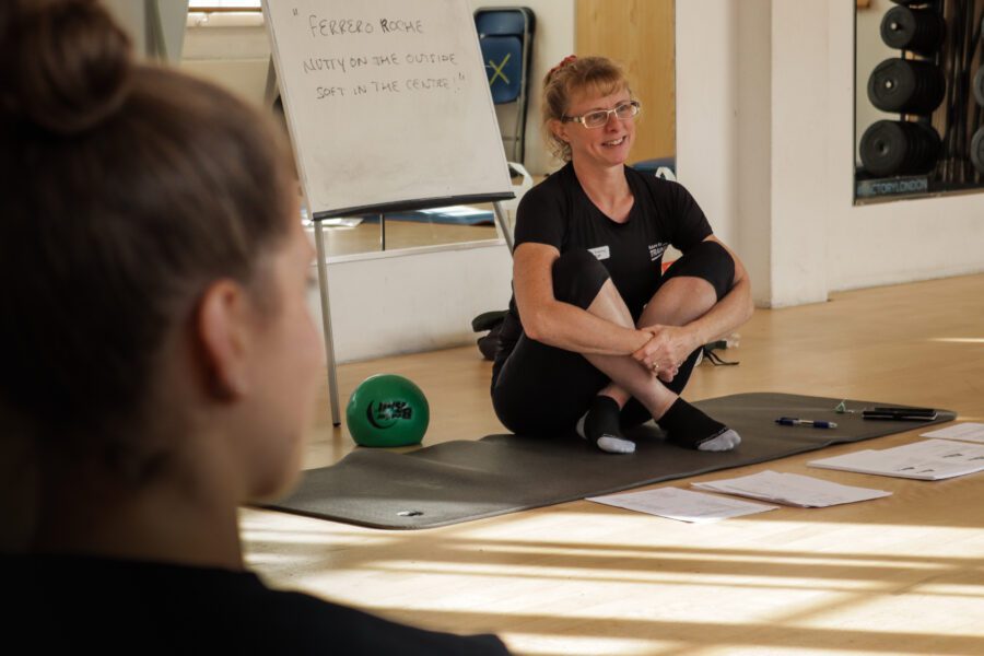 Pilates Mat Instructor teaching course students in London