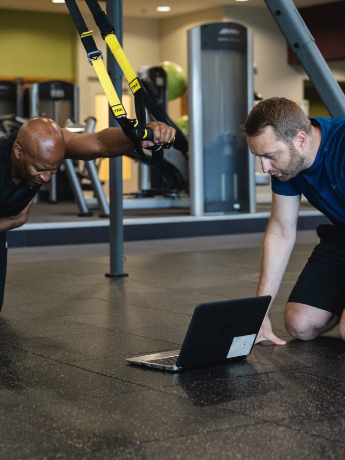 Personal trainer and client resistance training - future fit training