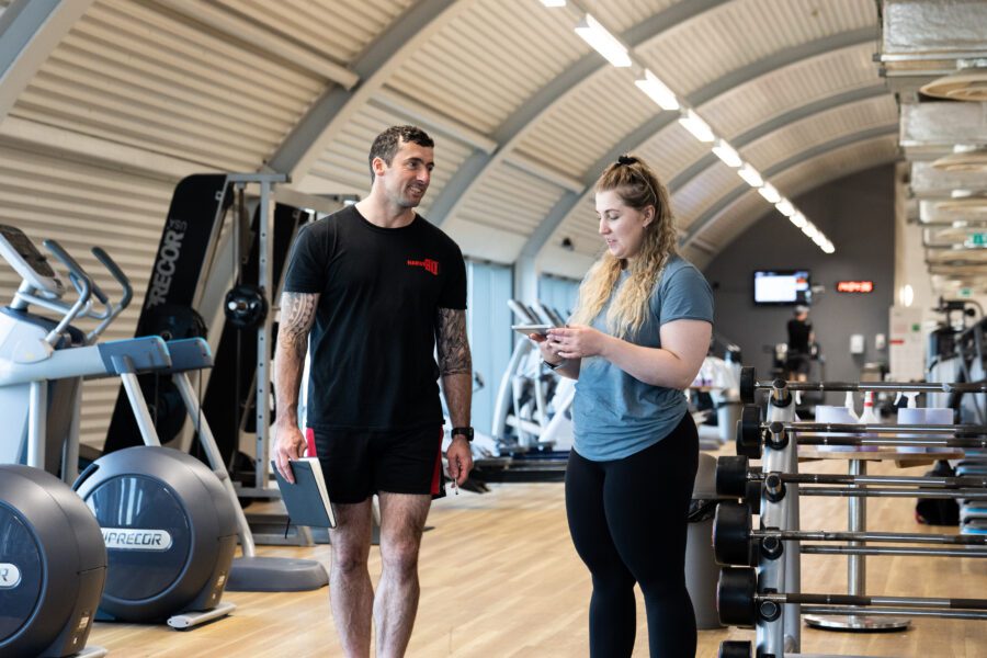 Personal trainer in a session with a client - CPD courses