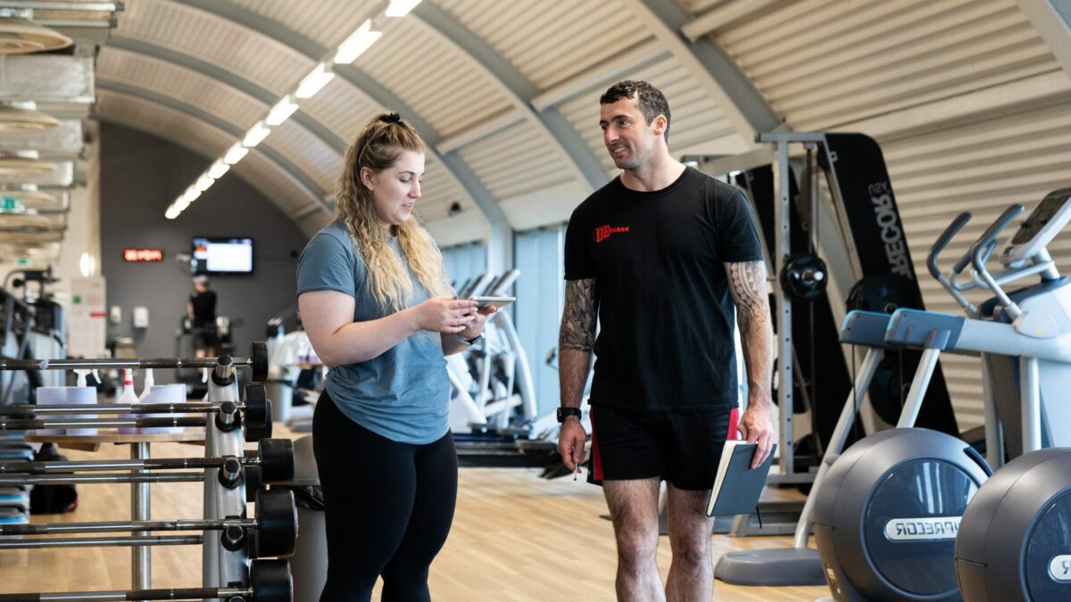 Personal trainer in a session with a client - CPD courses