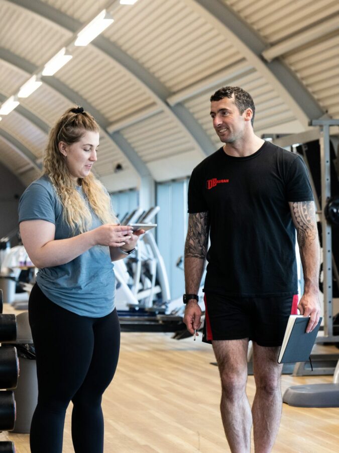 Personal trainer in a session with a client - CPD courses