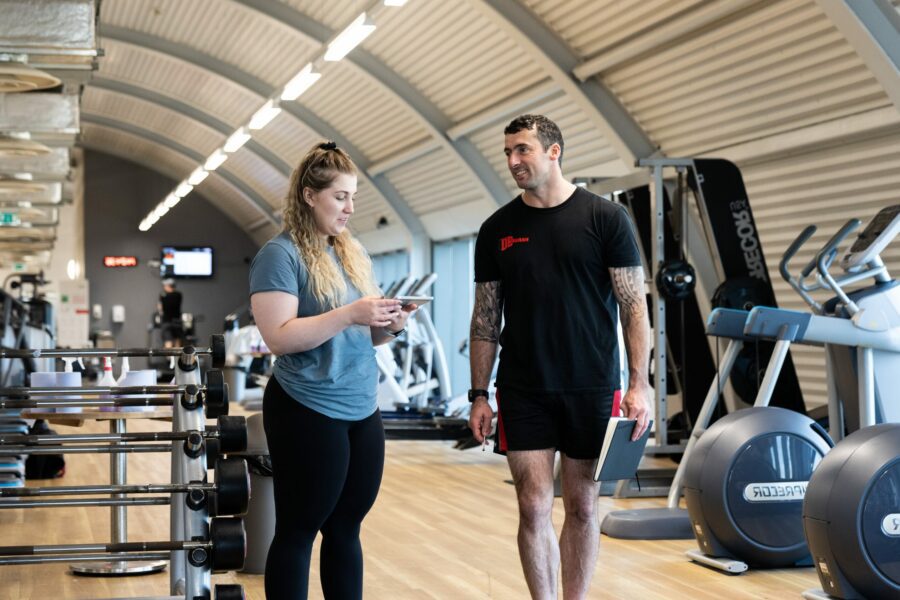 Personal trainer in a session with a client - CPD courses