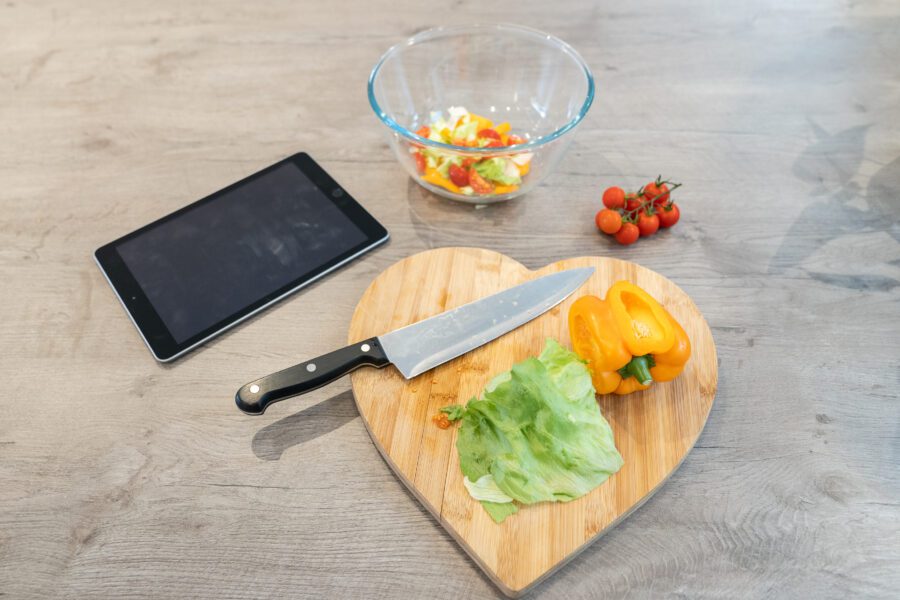 Nutrition Coach prepping a salad