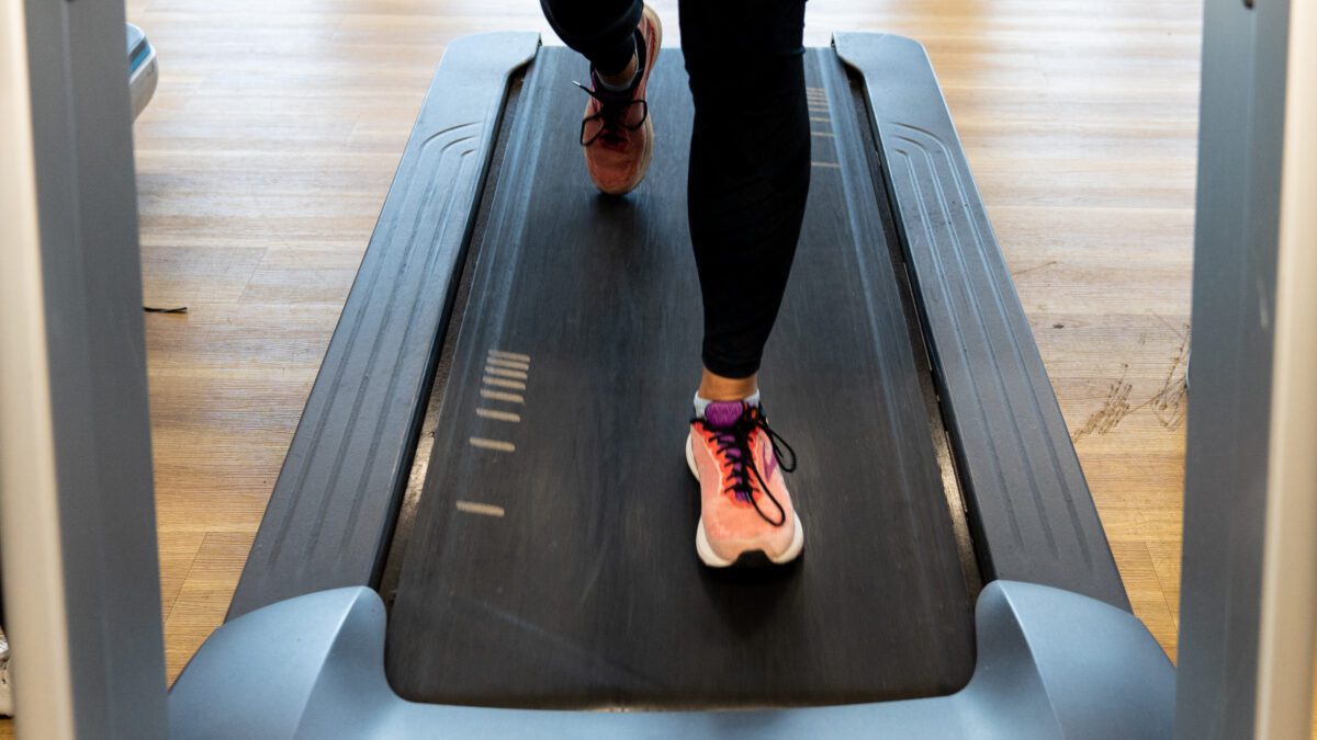 woman's feet running on a treadmill