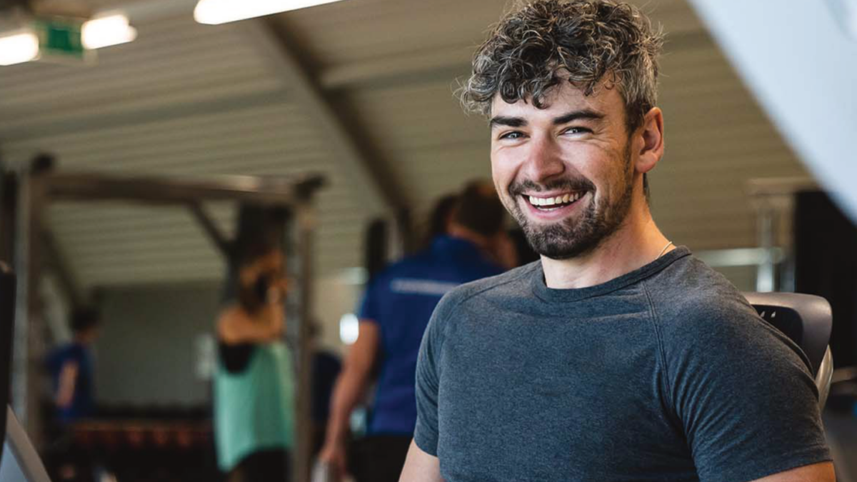 male using gym equipment