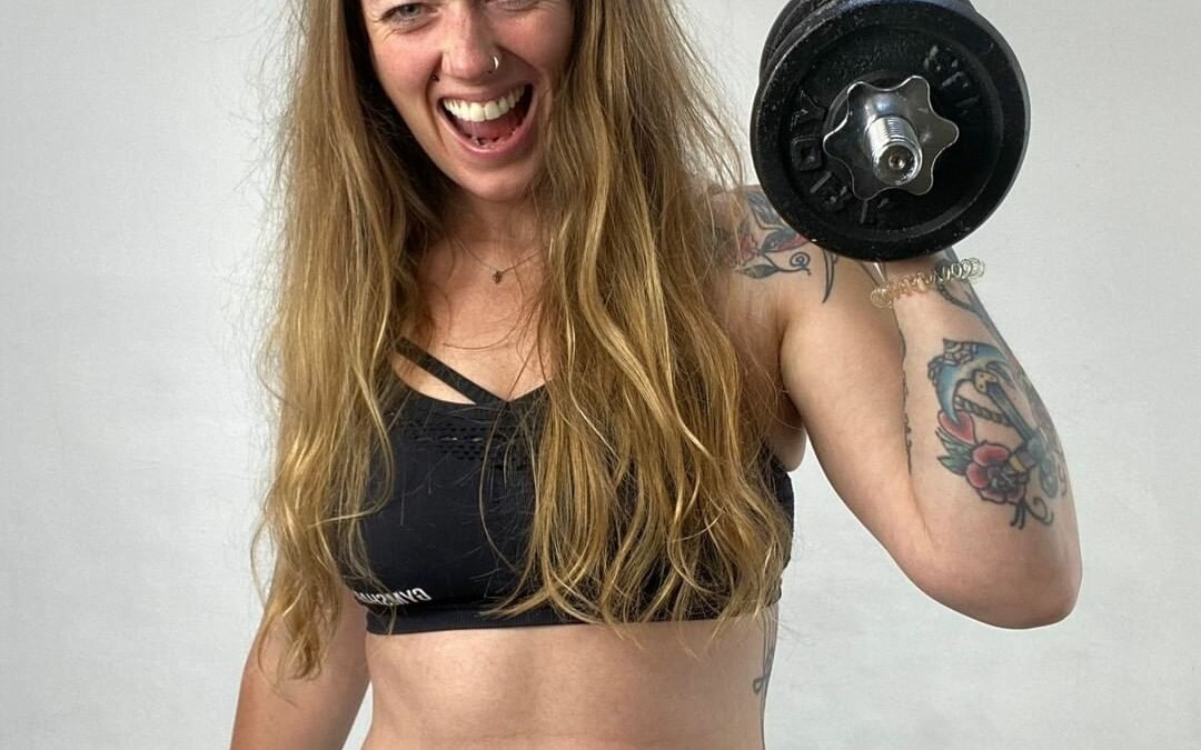 Becky Jones holding a dumbbell