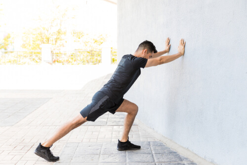 Standing wall stretch