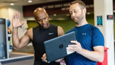 Personal trainer with client