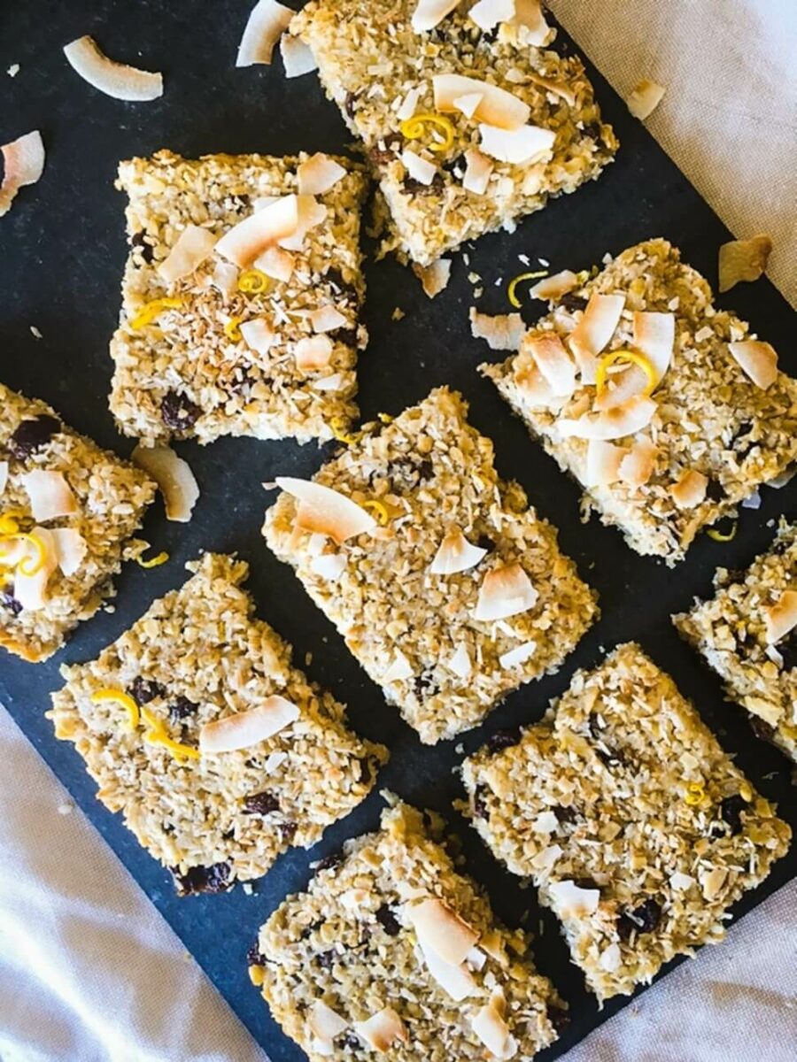 An overhead shot of 9 flapjacks with coconut on top