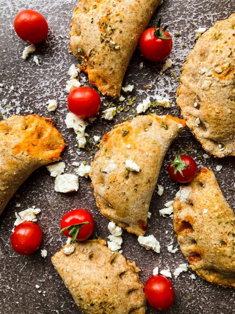 A zoomed in shot of Jo Sardella's pasties with cherry tomatoes interspersed
