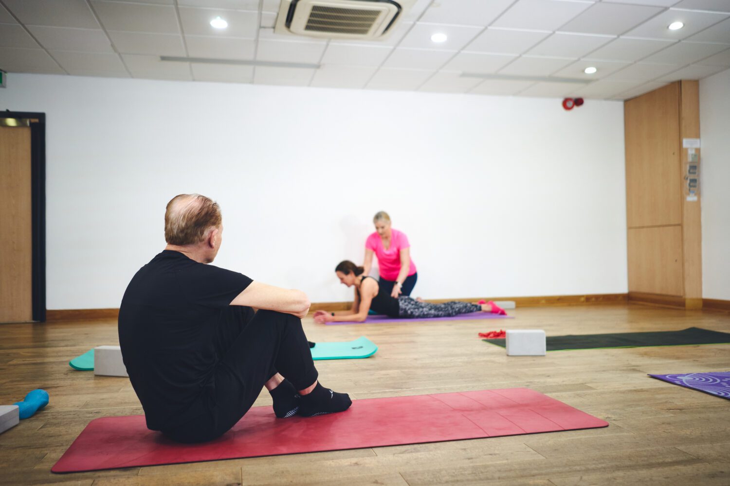pilates instructor demonstrating techniques